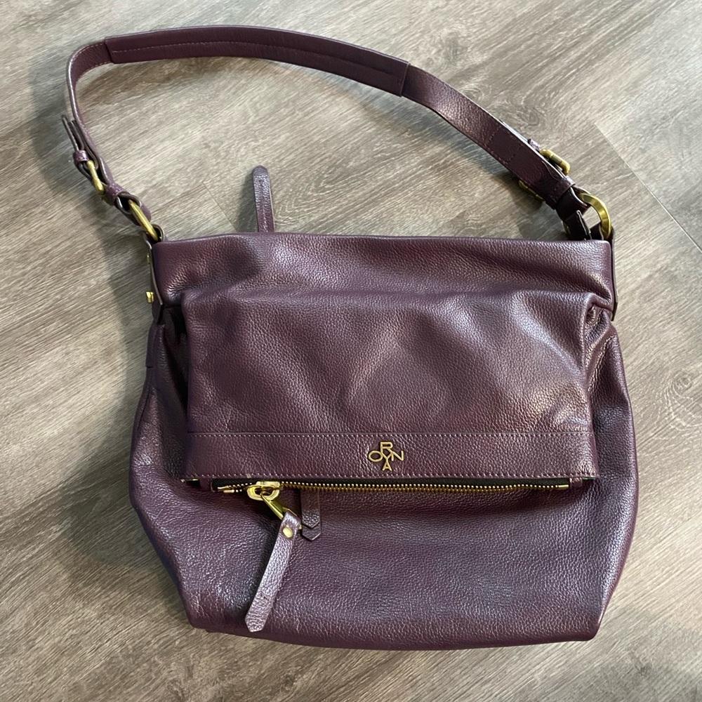 Oryany 100% Pebble Leather Fold Over Shoulder Purse. Beautiful dark maroon color